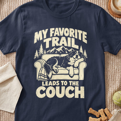 A dog on a couch with text "My favorite trail leads to the couch".
