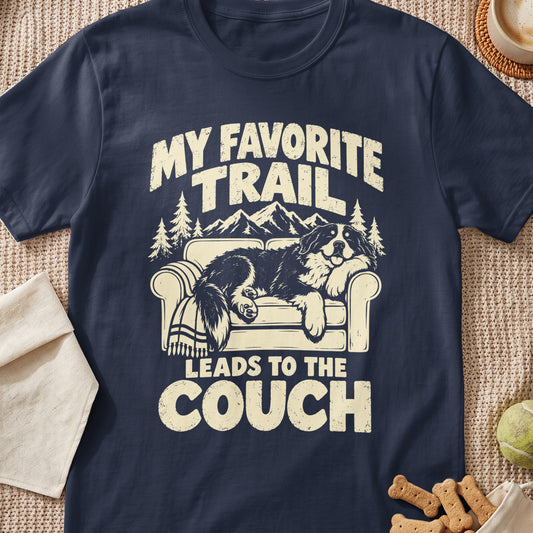 A dog on a couch with text "My favorite trail leads to the couch".