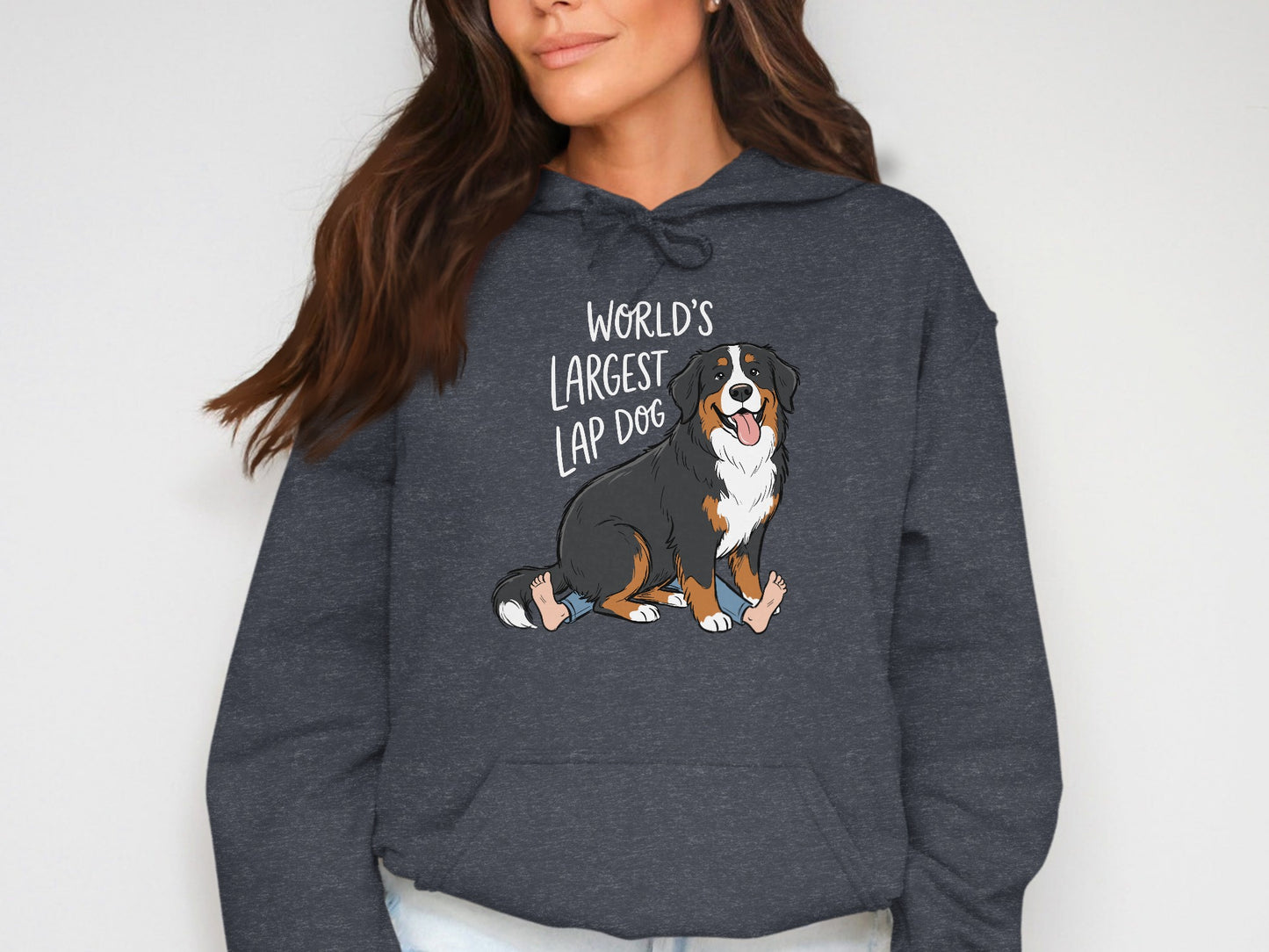 Bernese Mountain Dog graphic with text "WORLD'S LARGEST LAP DOG" and seated dog with legs.
