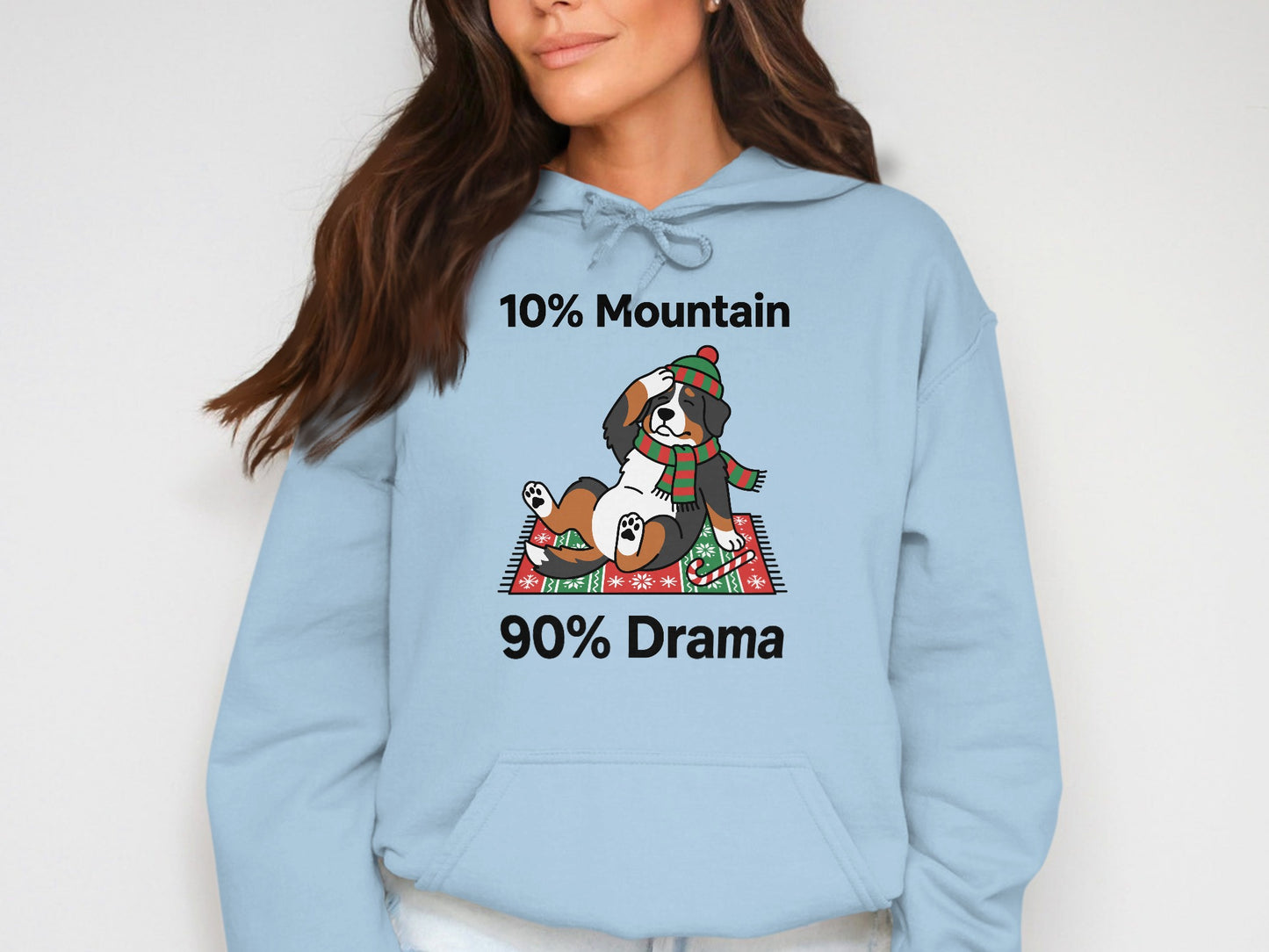 Light blue hoodie with Bernese Mountain Dog graphic and text 10% Mountain 90% Drama.
