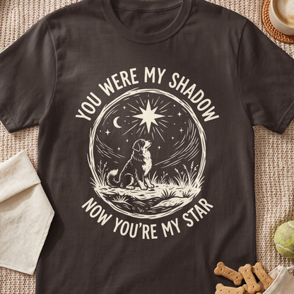 Dog looking up at a star with text "You Were My Shadow Now You're My Star."