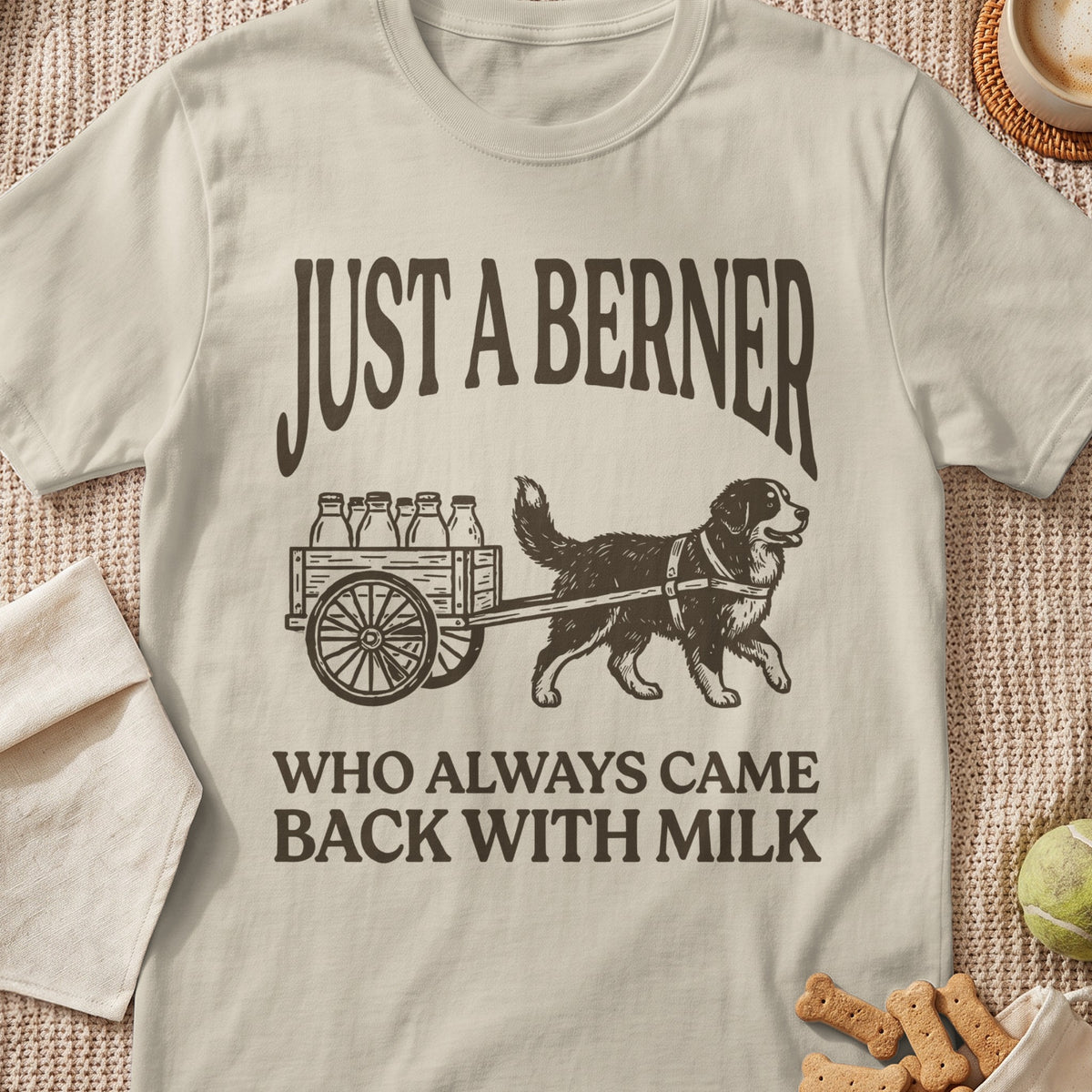 Bernese Mountain Dog pulls cart with milk bottles; text reads "JUST A BERNER WHO ALWAYS CAME BACK WITH MILK".