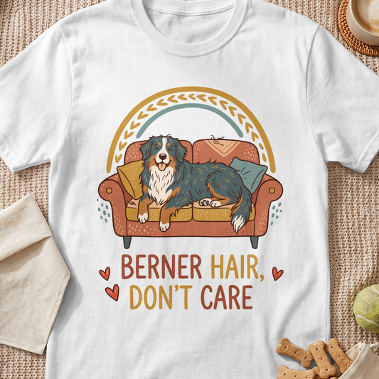 Bernese Mountain Dog on couch with text "BERNER HAIR, DON'T CARE".