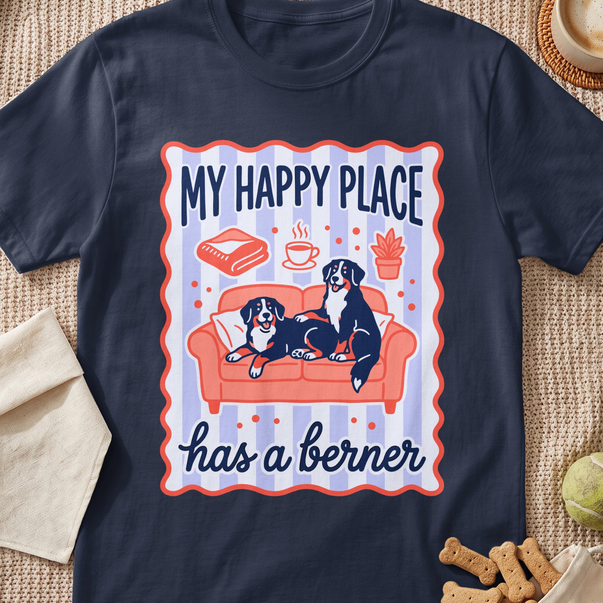Bernese mountain dogs on couch with text "My happy place has a berner".