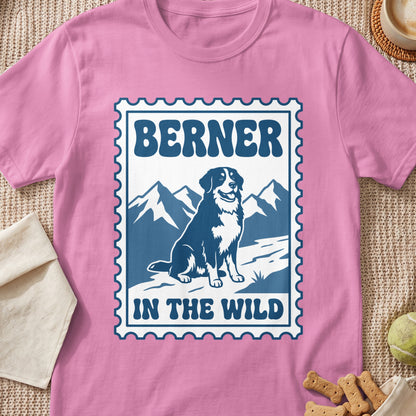 Pink t-shirt with a stamp design featuring a Berner dog and mountains.