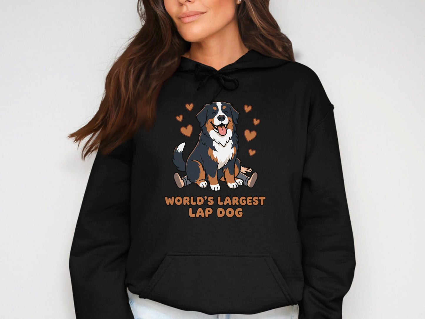 Black hoodie with cartoon Bernese Mountain Dog and "WORLD'S LARGEST LAP DOG" text.