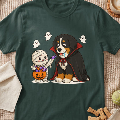 Bernese Mountain Dog dressed as a vampire with mummy and ghosts, holding candy.