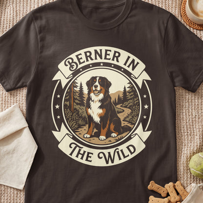 Bernese Mountain Dog in a forest scene with text "Berner In The Wild"