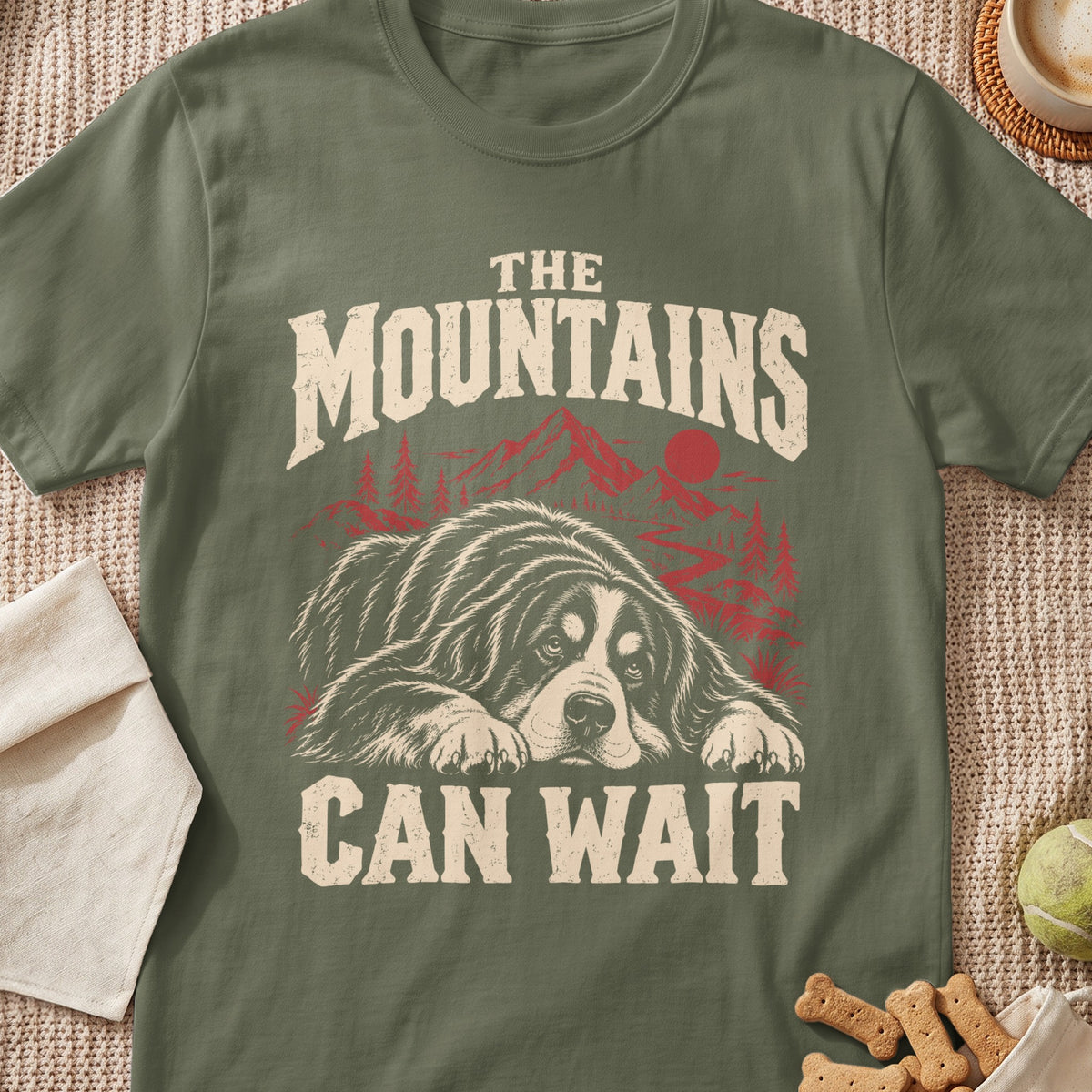 T-shirt with a Saint Bernard dog graphic and text "The Mountains Can Wait".
