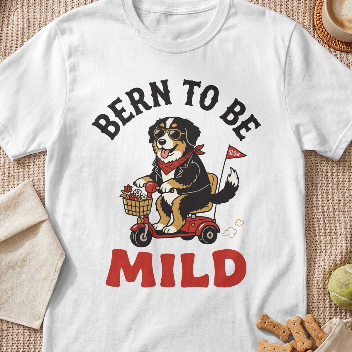 Bern to be Mild text with Bernese Mountain Dog on a scooter.