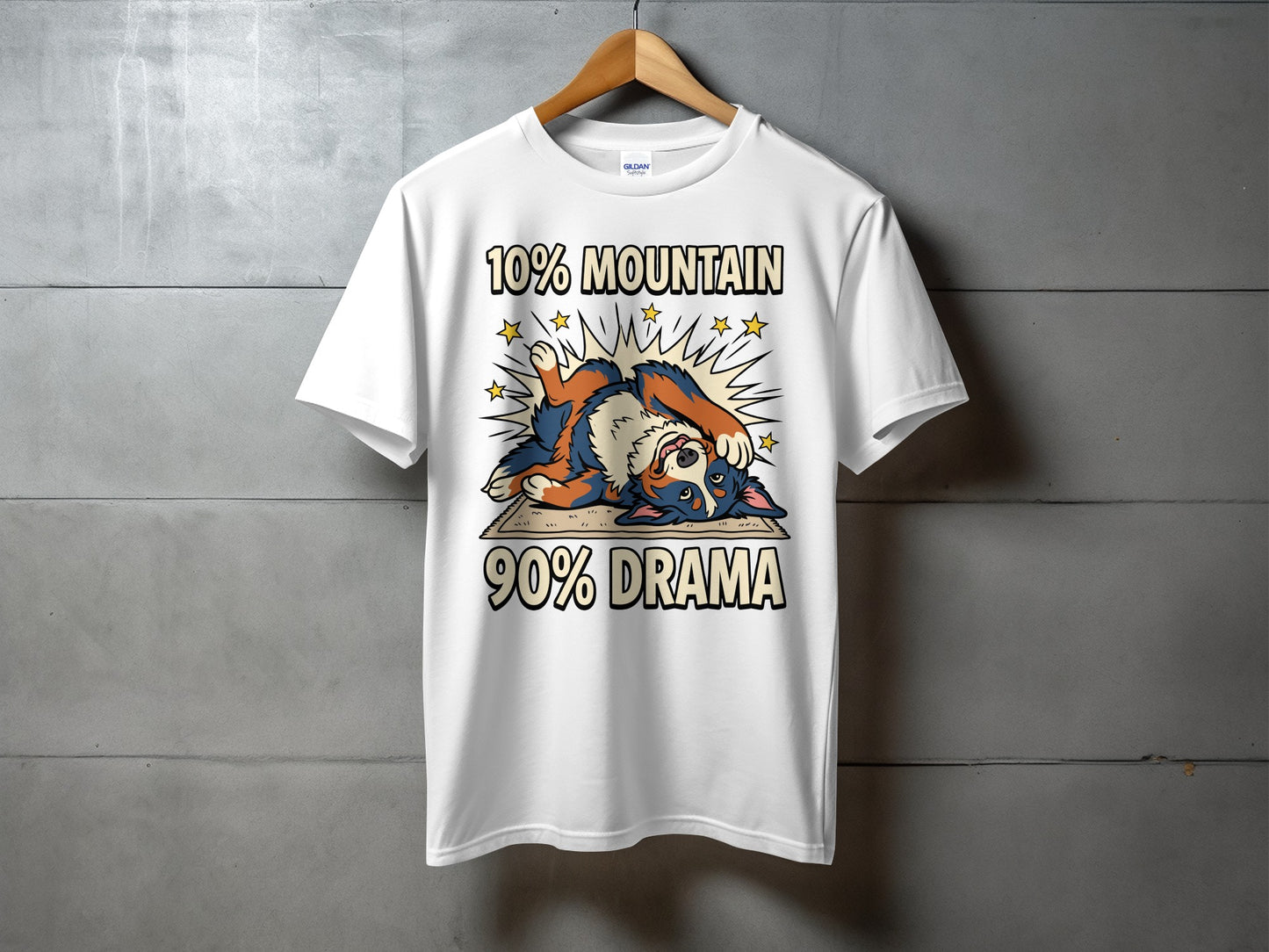 White t-shirt with cartoon dog and text "10% MOUNTAIN 90% DRAMA".