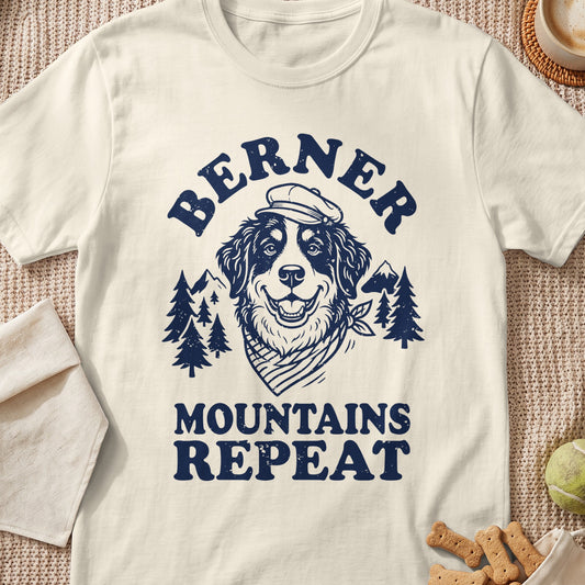 Bernese Mountain Dog wearing a cap with text "Berner Mountains Repeat".