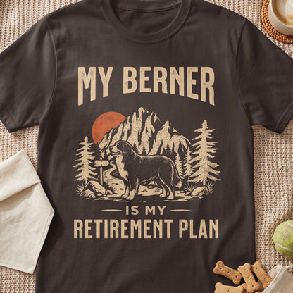 Dark brown t-shirt with a graphic of a Berner dog, mountains, and the text "My Berner is My Retirement Plan".