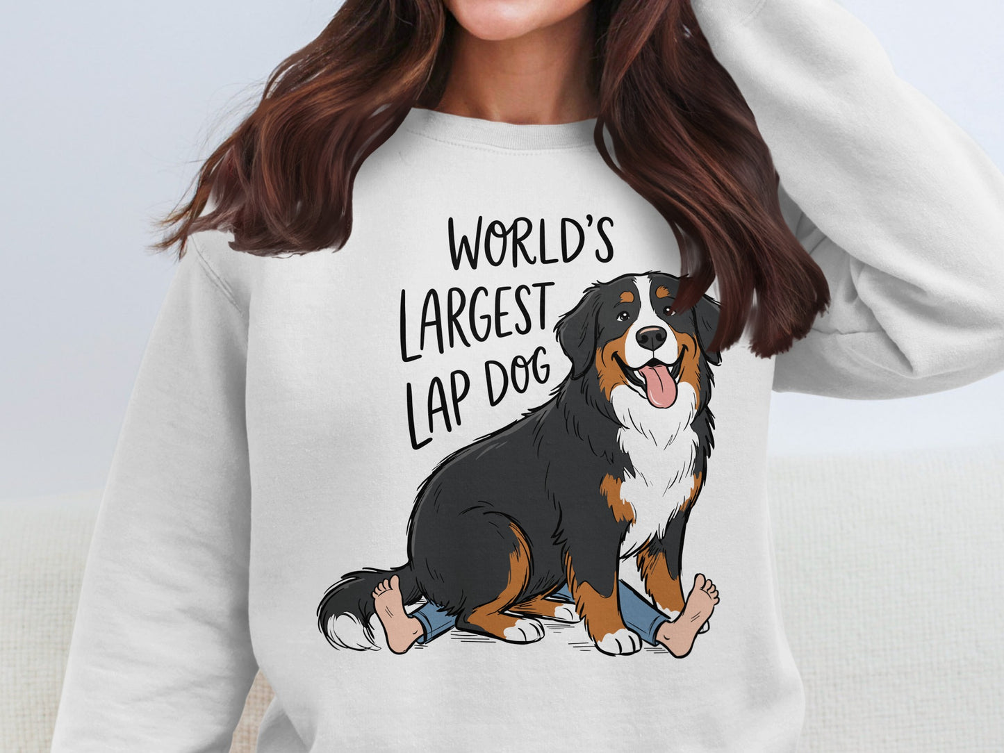 Bernese Mountain Dog on top of human legs with text "WORLD'S LARGEST LAP DOG".