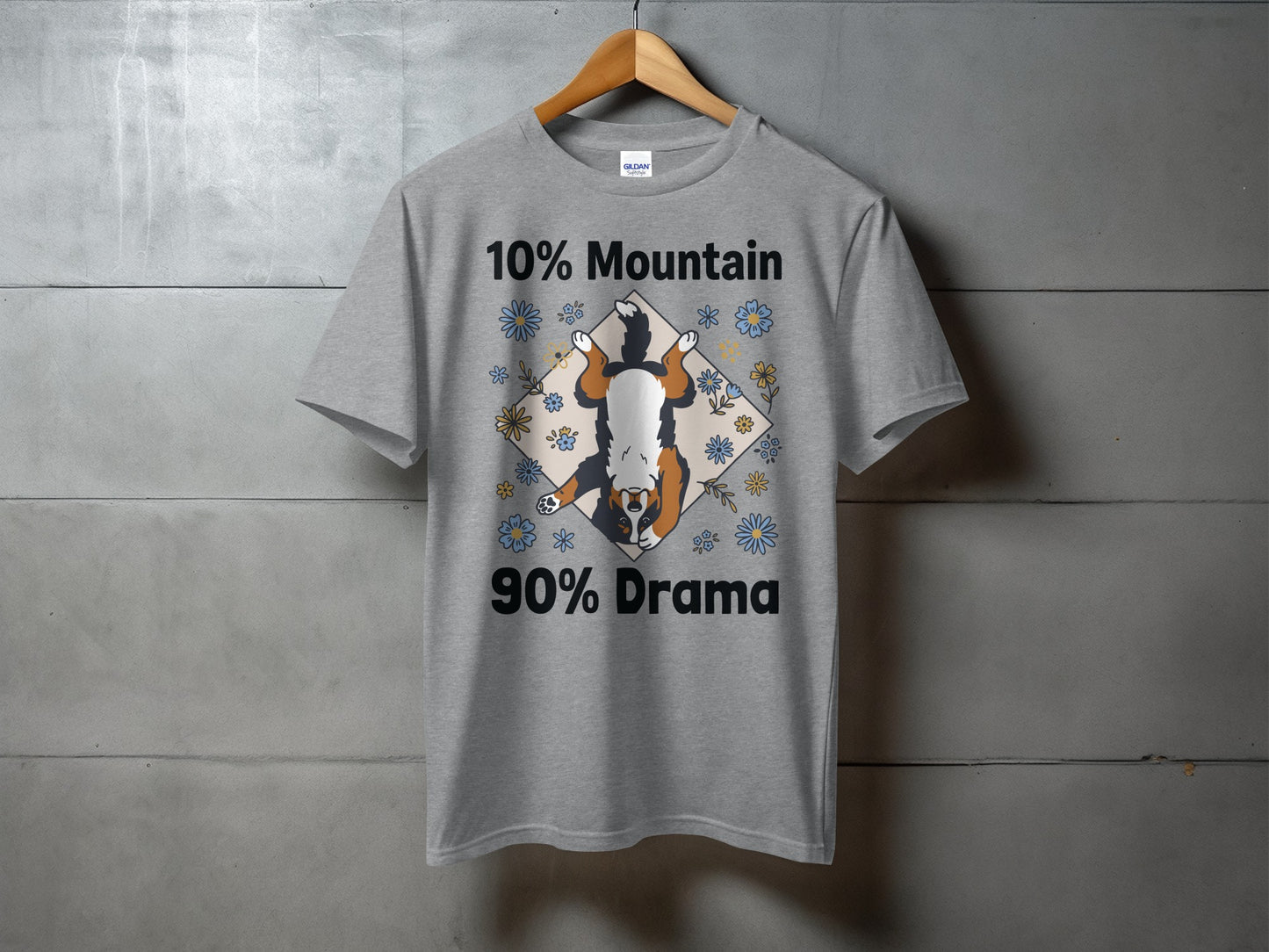 Grey t-shirt with text "10% Mountain 90% Drama" and dog illustration.