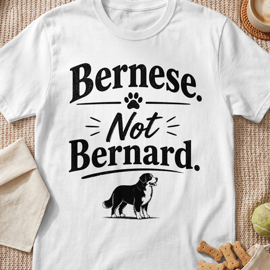 White t-shirt with "Bernese. Not Bernard." text and a Bernese Mountain Dog illustration.