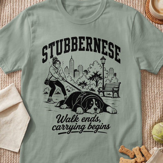 T-shirt graphic with text "STUBBERNESE" and illustration of a large dog refusing to walk.