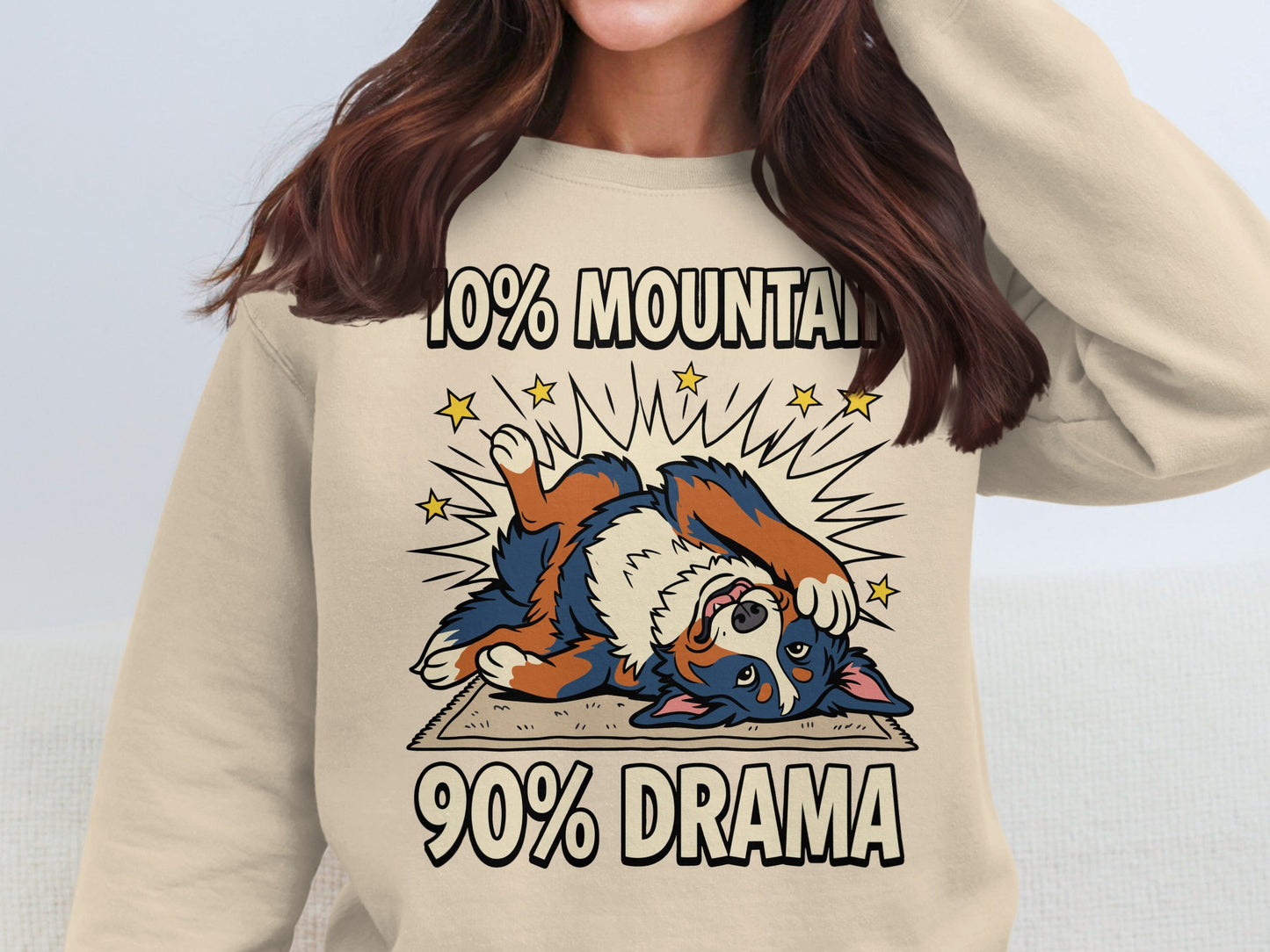 Bernese Mountain Dog pup on back with text "10% MOUNTAIN 90% DRAMA".