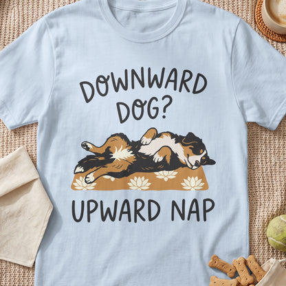 Light blue t-shirt with a dog lying on its back with text "DOWNWARD DOG? UPWARD NAP".