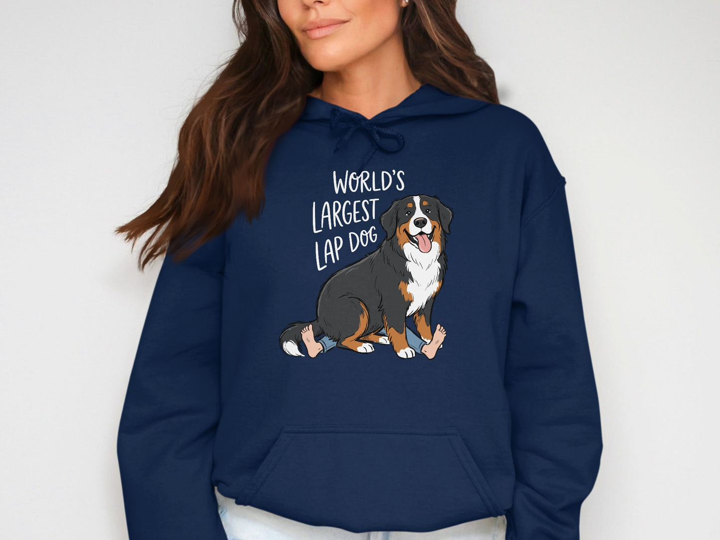 Navy hoodie with "WORLD'S LARGEST LAP DOG" text and cartoon Bernese Mountain Dog.