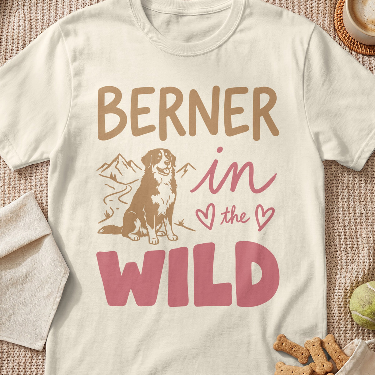 Cream t-shirt with "BERNER in the WILD" text and a Bernese Mountain Dog illustration.