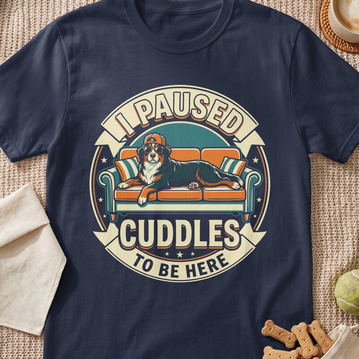 Bernese Mountain Dog on couch with sunglasses, text "I PAUSED CUDDLES TO BE HERE"