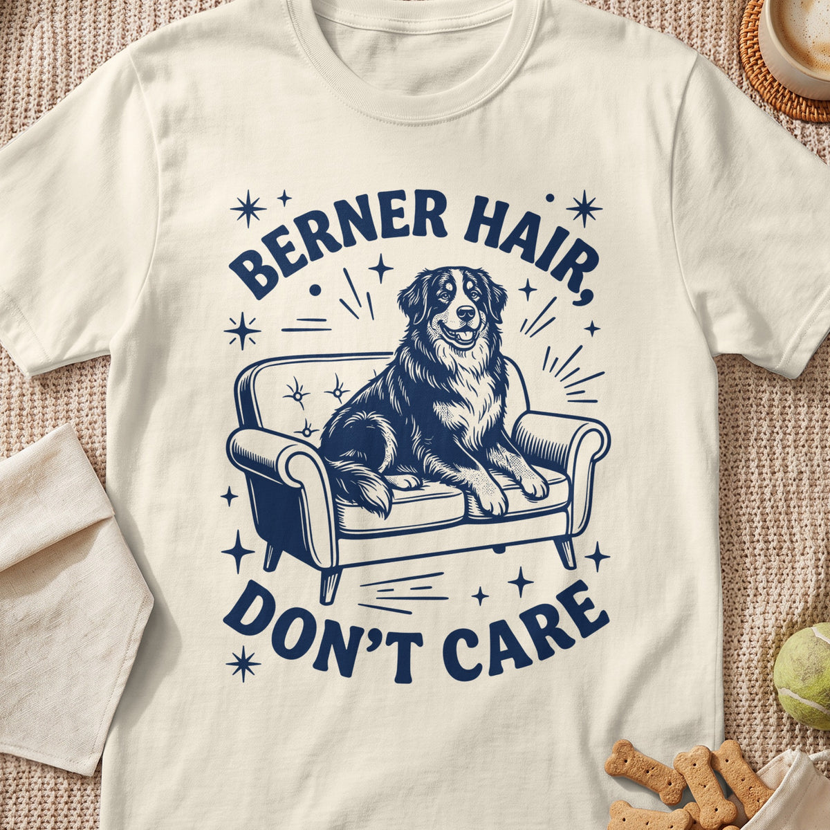 Bernese Mountain Dog on sofa with text "Berner Hair, Don't Care".