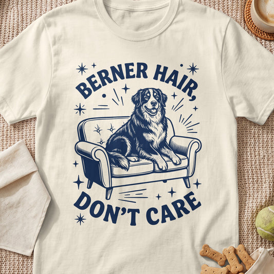 Bernese Mountain Dog on sofa with text "Berner Hair, Don't Care".