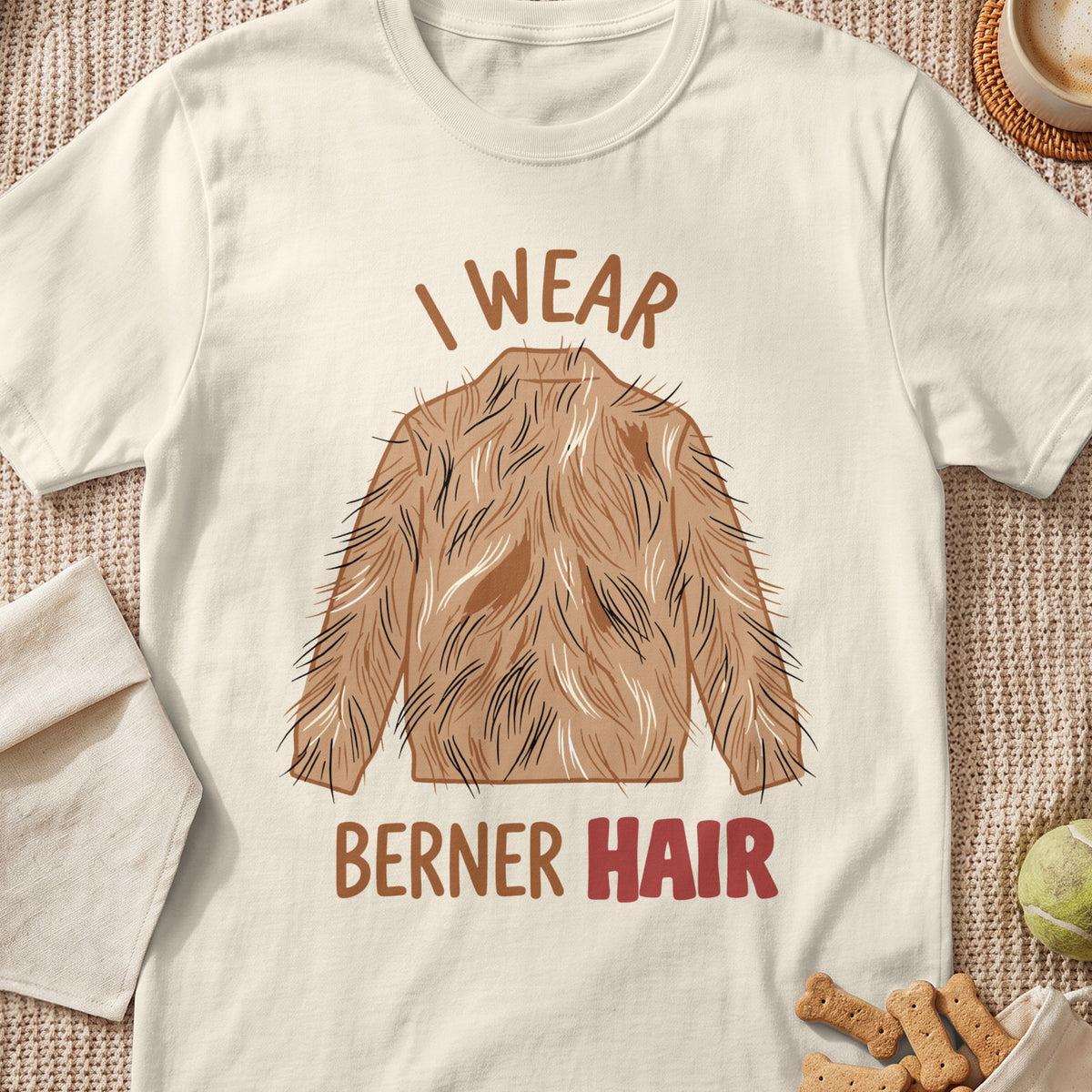 Shirt with "I wear BERNER HAIR" text and a cartoon dog shedding fur design.