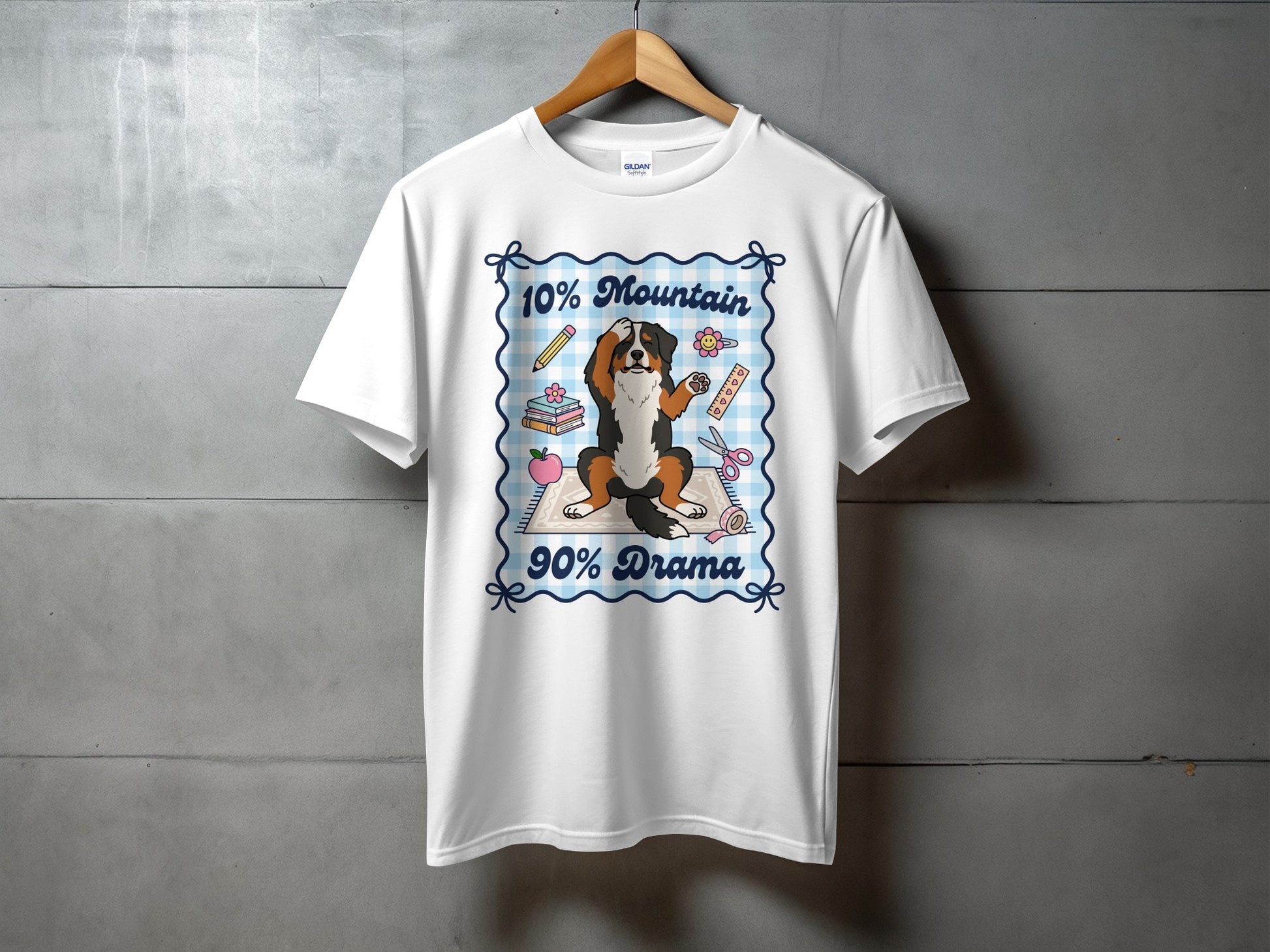 White t-shirt with cartoon Bernese Mountain Dog and text "10% Mountain 90% Drama".