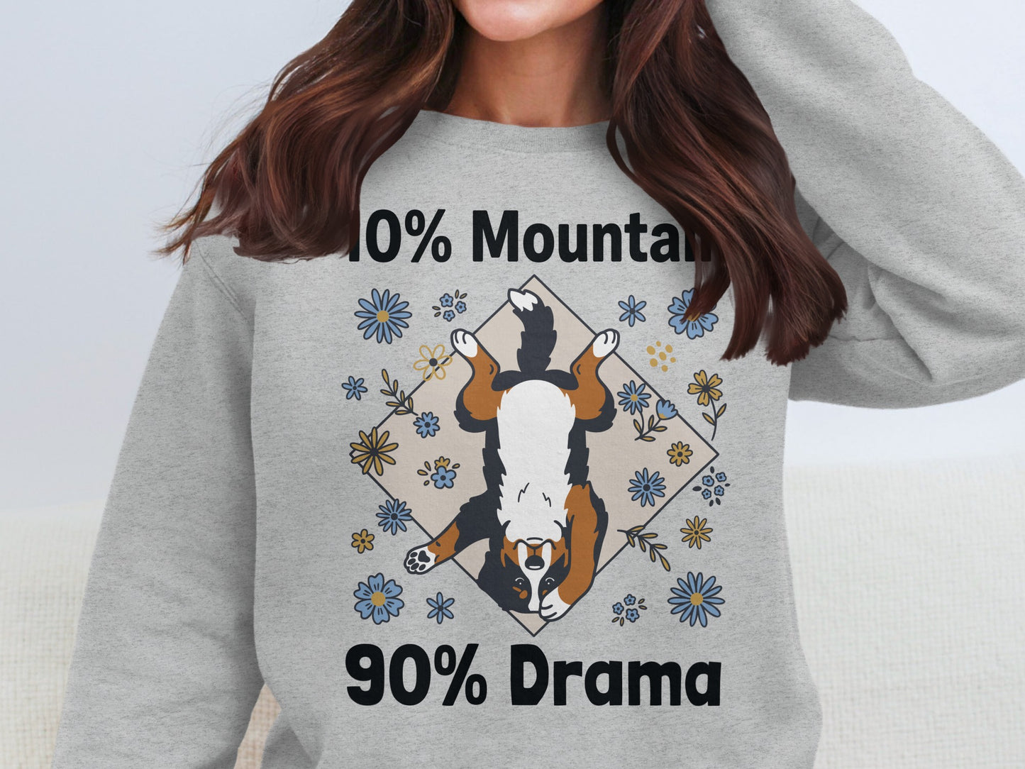 Grey sweatshirt with inverted dog art and text "10% Mountain 90% Drama".