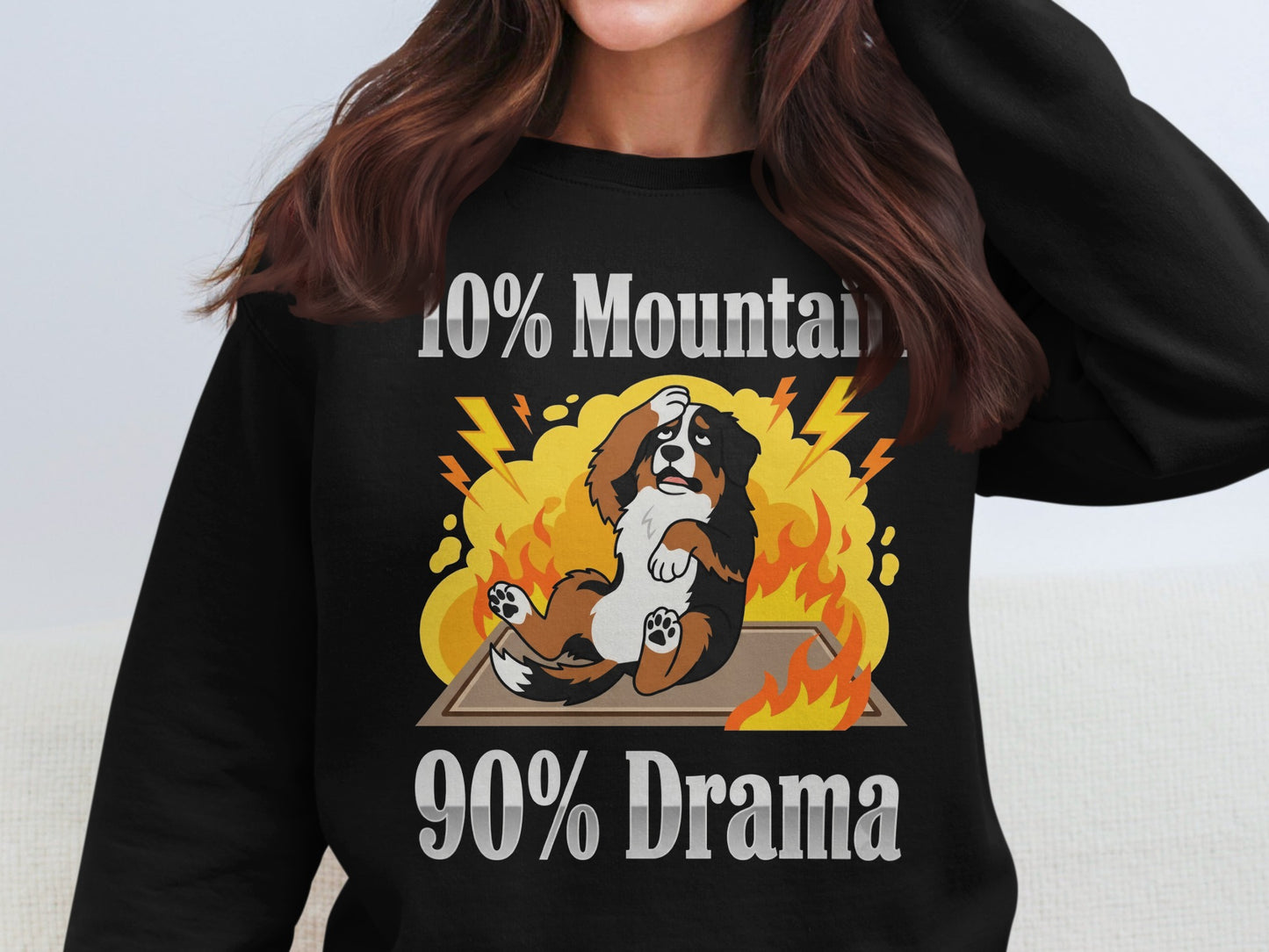 Black sweatshirt with cartoon dog on fire, text "10% Mountain 90% Drama".
