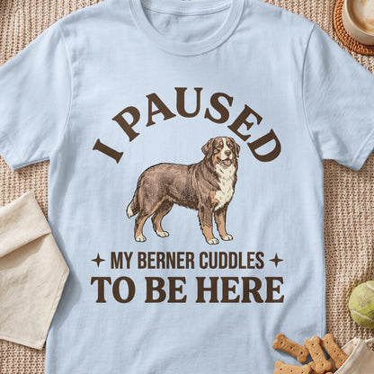 Light blue t-shirt with a dog graphic and the text "I PAUSED MY BERNER CUDDLES TO BE HERE".
