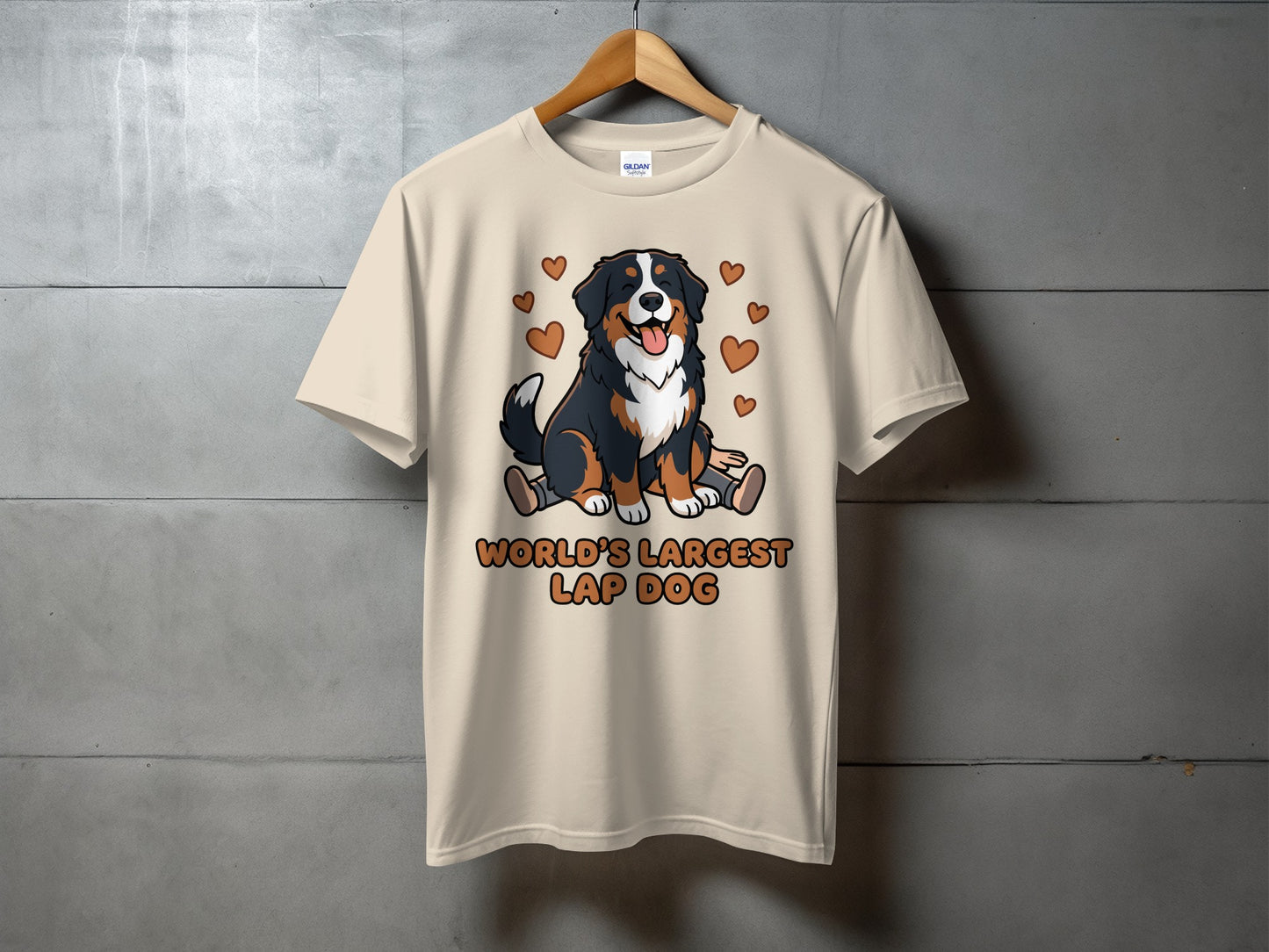 Cream t-shirt with cartoon Bernese Mountain Dog and text "WORLD'S LARGEST LAP DOG".