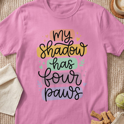 Pink t-shirt with "my Shadow has four paws" text and small hearts.
