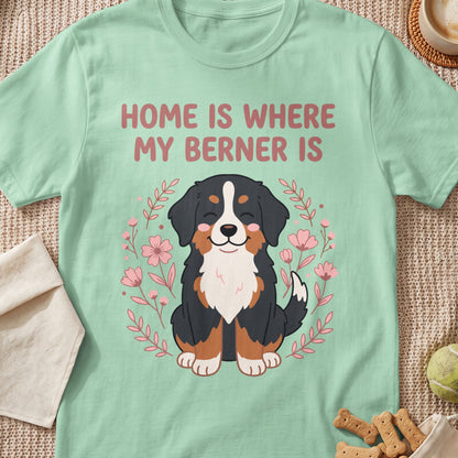 Mint green t-shirt with a cartoon Bernese Mountain Dog surrounded by flowers and text "HOME IS WHERE MY BERNER IS".