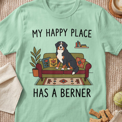 Mint green t-shirt with a Bernese Mountain Dog sitting on a couch, text reads "My Happy Place Has A Berner".