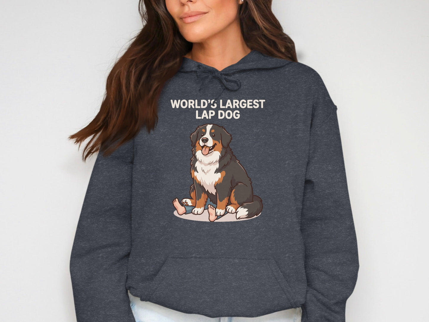 Bernese Mountain Dog graphic with text "WORLD'S LARGEST LAP DOG" on a dark hoodie.