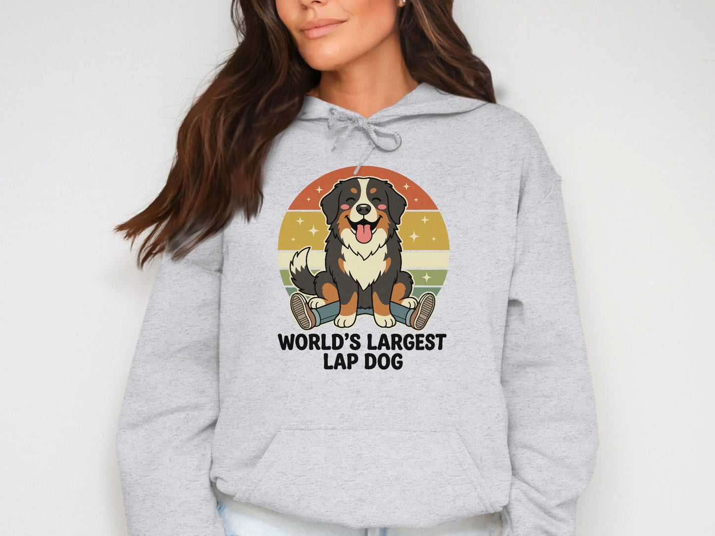 Grey hoodie with cartoon Bernese Mountain Dog and text "WORLD'S LARGEST LAP DOG".