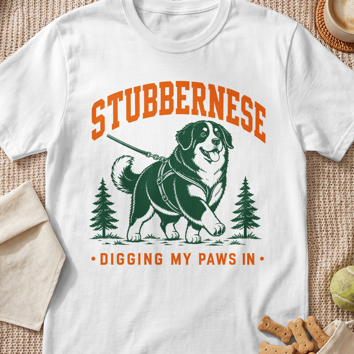 Bernese Mountain Dog graphic on white shirt with text "STUBBERNESE DIGGING MY PAWS IN".