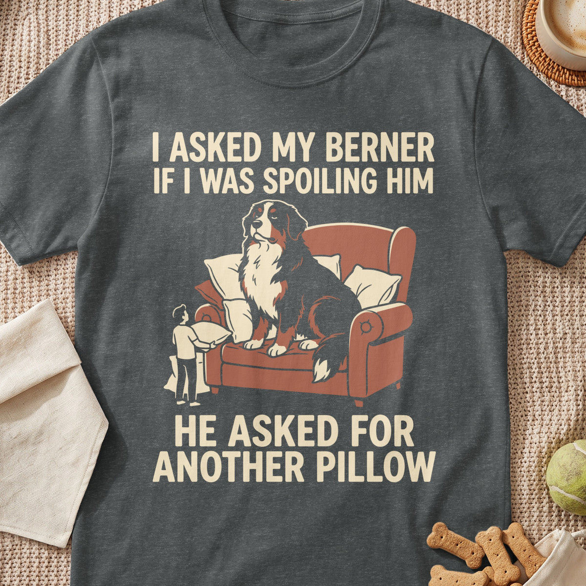 Bernese Mountain Dog on armchair, text reads "I asked my Berner if I was spoiling him, he asked for another pillow".