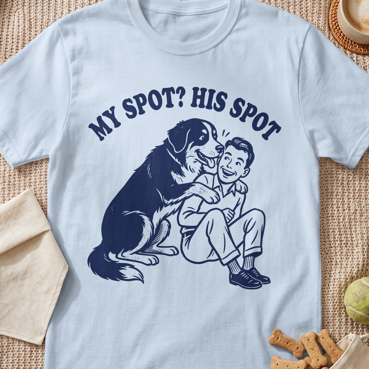 Light blue t-shirt with dark blue graphic of dog hugging man, text "MY SPOT? HIS SPOT".