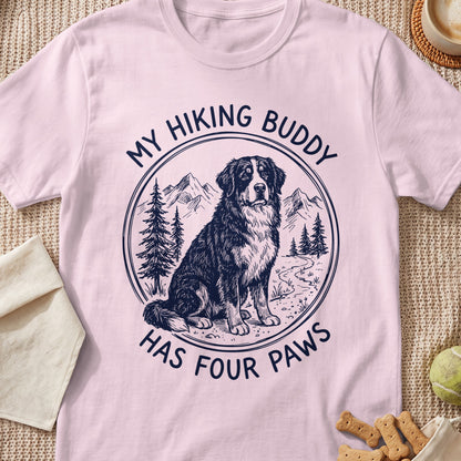 Bernese Mountain Dog sits in circle with mountains and trees; text reads "MY HIKING BUDDY HAS FOUR PAWS".