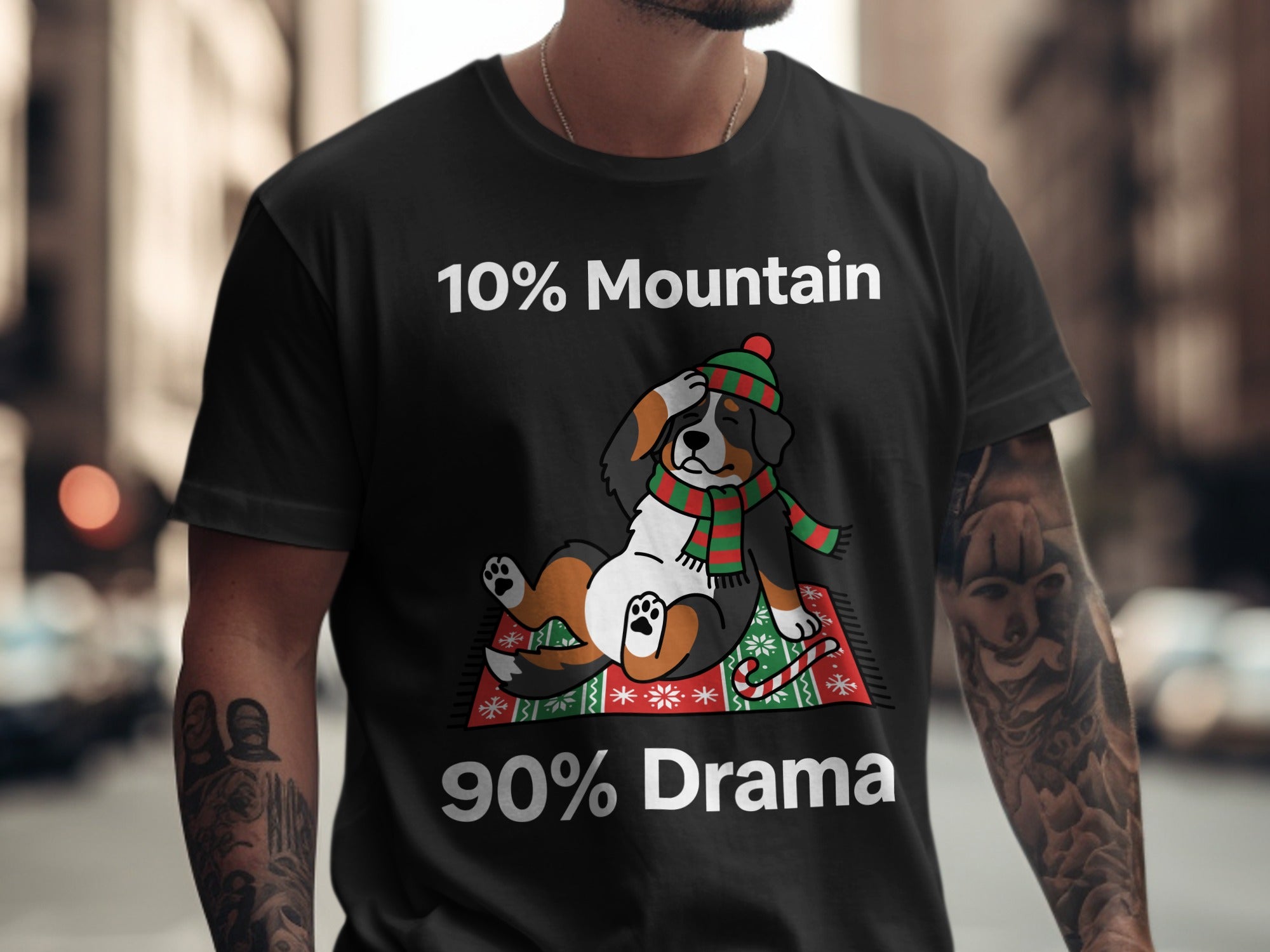 Black t-shirt with text "10% Mountain" and cartoon dog in scarf/hat, "90% Drama."