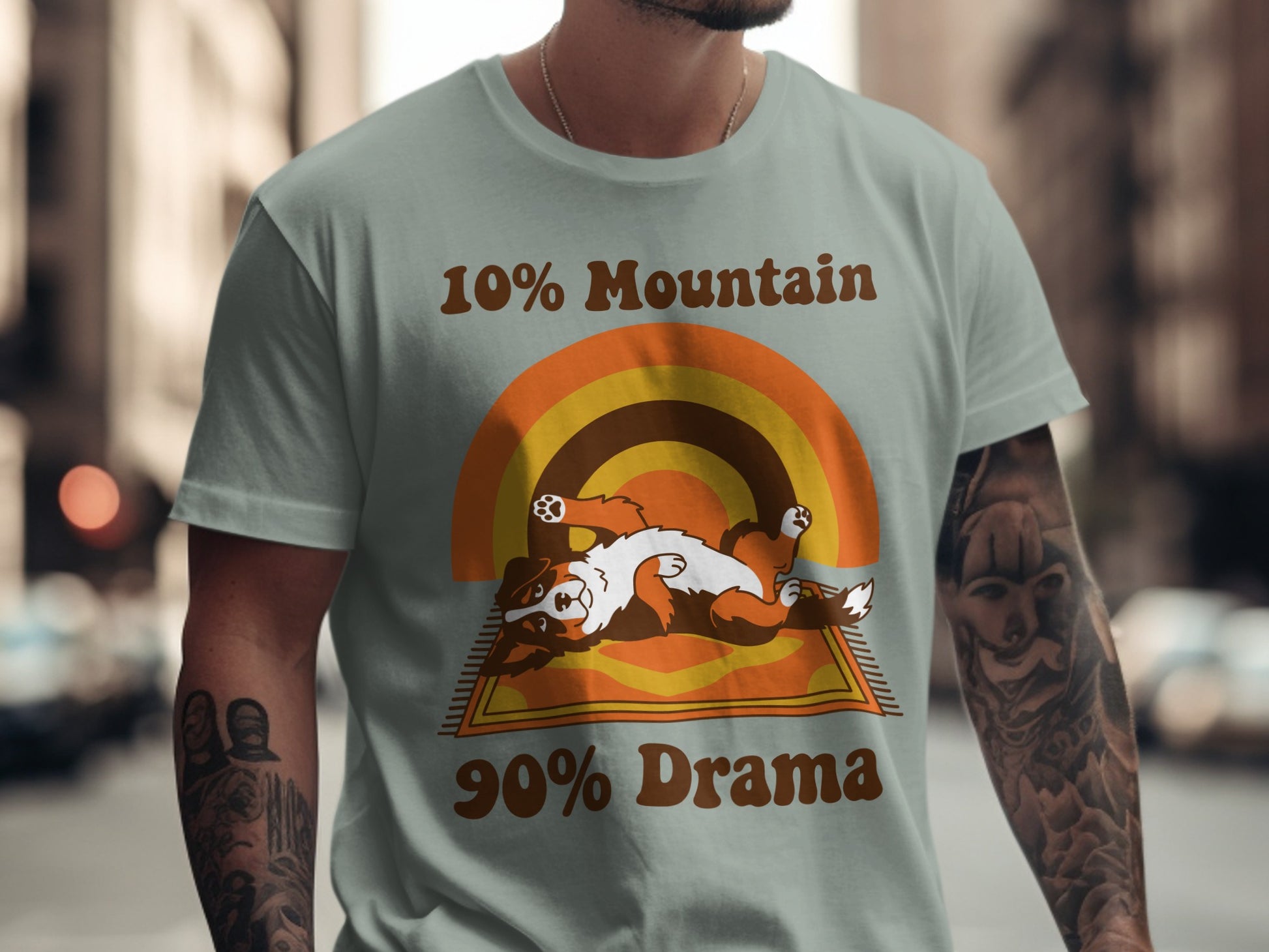 T-shirt graphic with text "10% Mountain 90% Drama" and a dog.