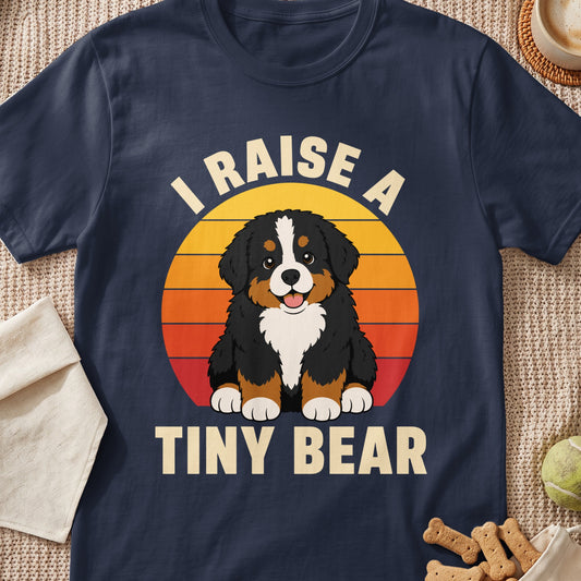 Bernese Mountain Dog puppy graphic with text "I RAISE A TINY BEAR".