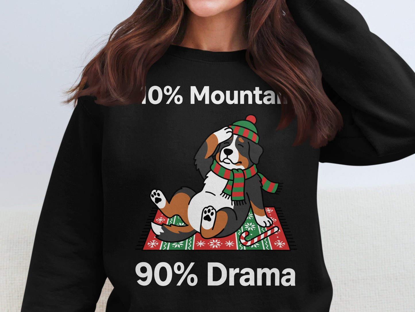 Bernese Mountain Dog wearing a Santa hat and scarf, with text "10% Mountain 90% Drama".