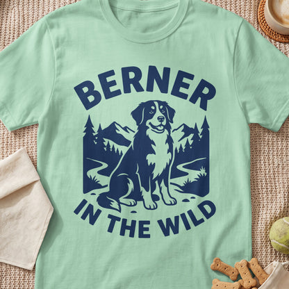 Light green t-shirt with navy blue graphic of a Bernese Mountain Dog and the words "BERNER IN THE WILD".