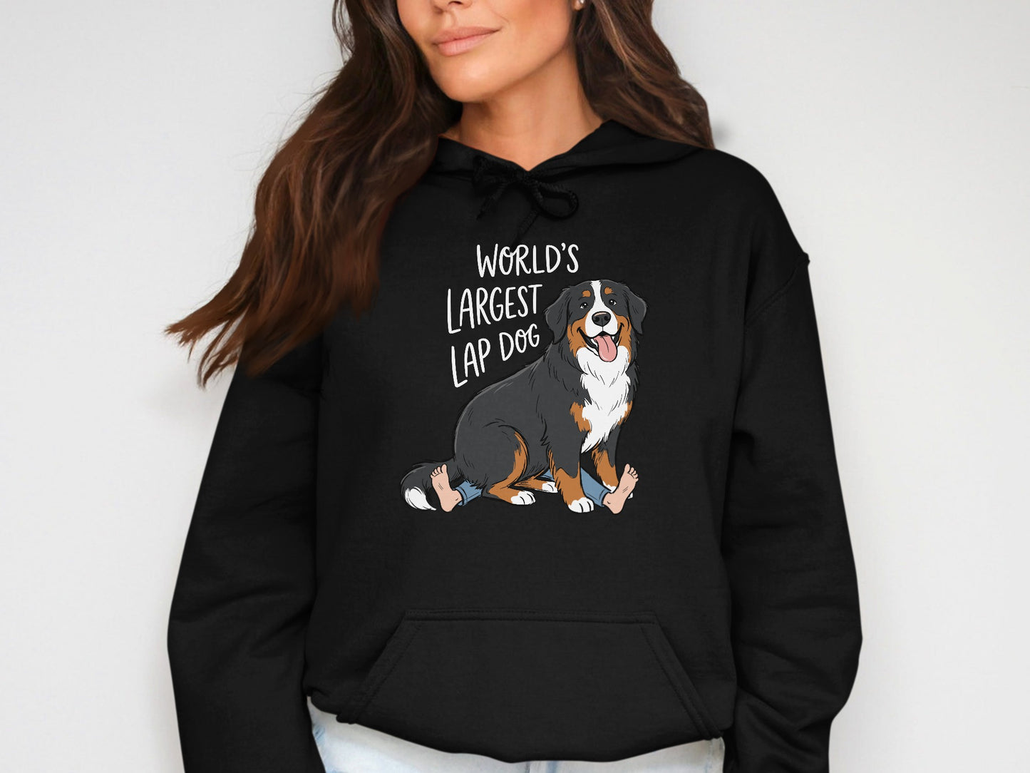 Black hoodie with "WORLD'S LARGEST LAP DOG" text and cartoon Bernese Mountain Dog.