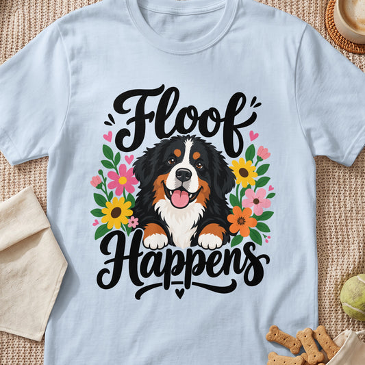Light blue t-shirt with a Bernese Mountain Dog, flowers, and text reading "Floof Happens".